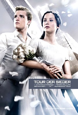 Wieder mal in schönster Riefenstahl-Ästhetik: Peeta und Katniss werden als tragisches TV-Liebespaar inszeniert. Foto: Lionsgate