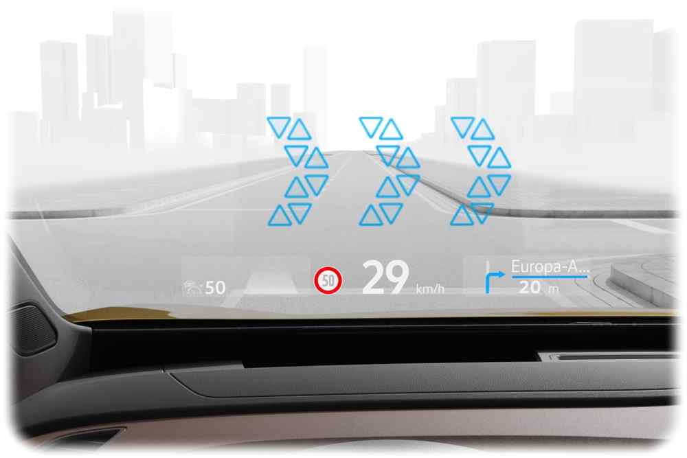 Erweiterte Realität (Augmented Reality) im ID3 und ID4: Der Computer projiziert die Navigationspfeile so auf die Windschutzscheibe, dass sie wie ein Teil der Umgebung wirken. Foto: Volkswagen