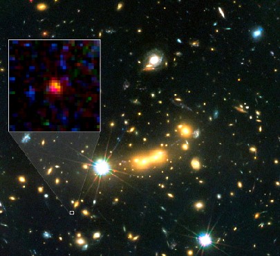 Der Ausschnitt aus einer Aufnahme des "Hubble"-Teleskops zeigt die bisher wohl älteste bisher entdeckte Galaxis "MACS0647-JD", deren Licht 13,3 Milliarden Jahre brauchte, um zur Erde zu gelangen. Abb.: NASA, ESA