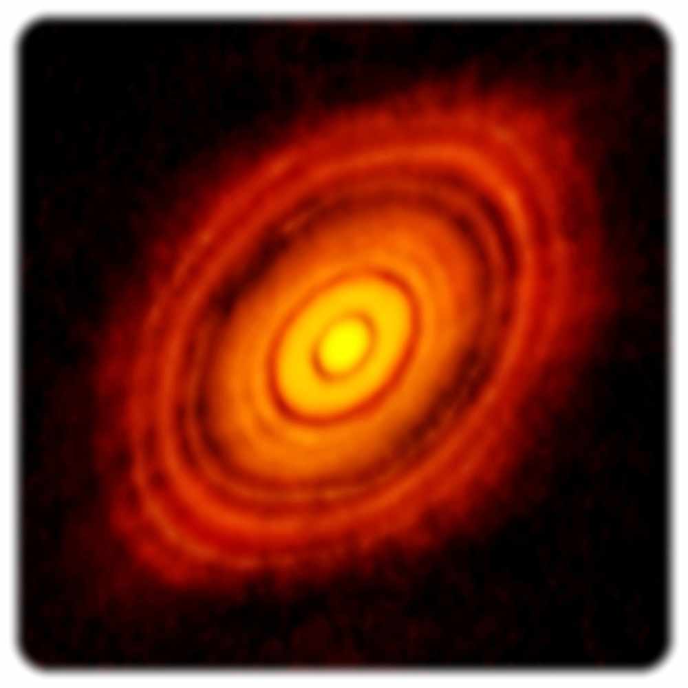 Diese Aufnahme des Alma-Observatoriums zeigt eine protoplanetare Scheibe um den Stern HL Tauri. Zu erkennen sind die Muster aus Ringen und Lücken, die auf Druckschwellen und an diesen Stellen entstehende Planeten hinweisen. Abb.: Alma, Eso