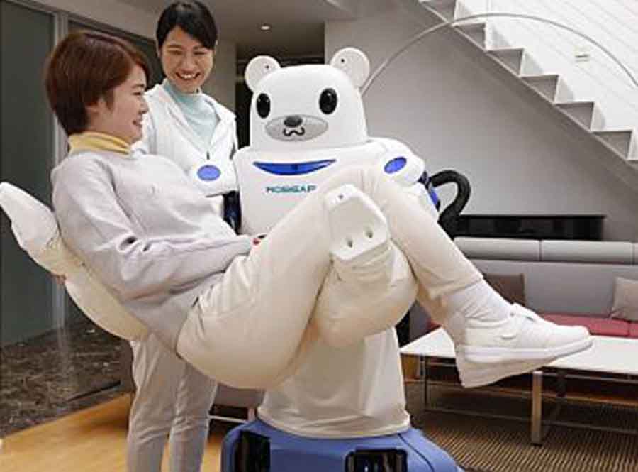 In Japan experimentieren Forschungseinrichtungen wie das Riken-Zentrum bereits seit Jahren mit dem Robotereinsatz in Haushalten und in der Pflege. Hier ist zum Beispiel ein "Robobear" zu sehen, der einen Menschen tragen kann. Foto: Riken